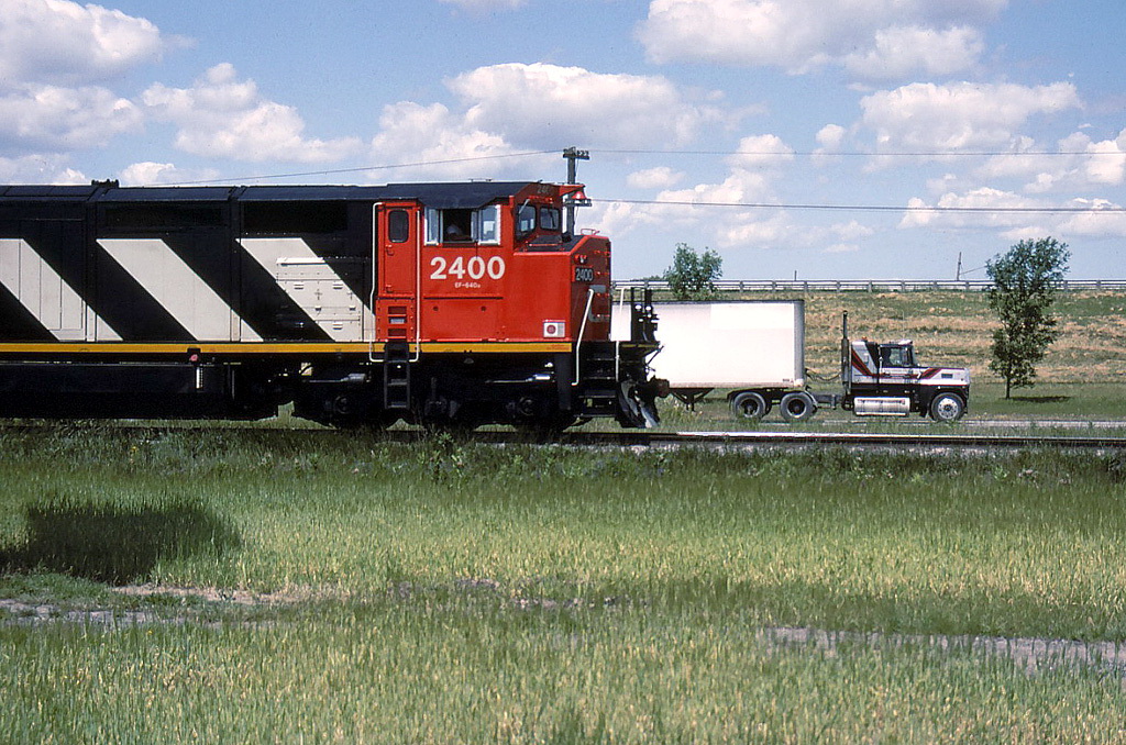 CN 206 goes past the truck stop.