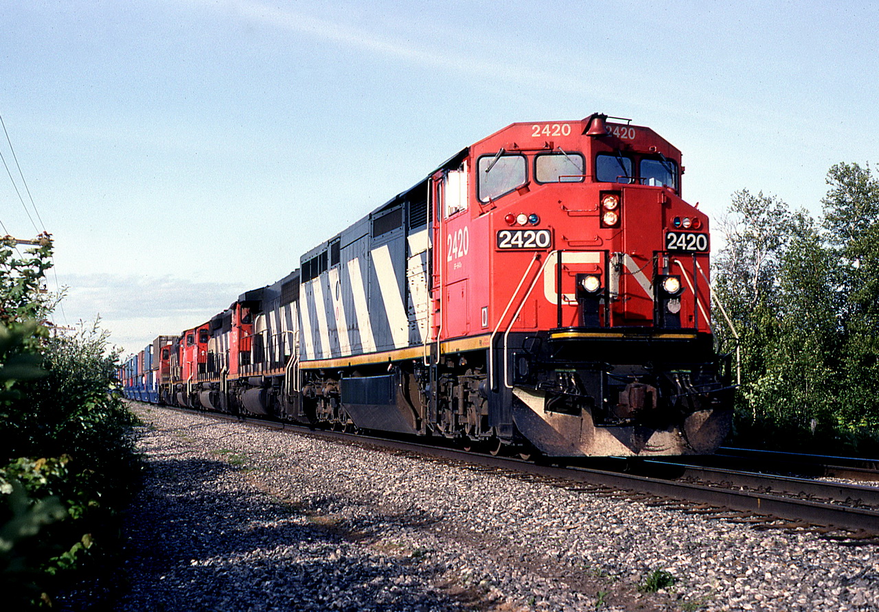 CN 207 led by 2 year old GE 2420,the 1st GEs bought by CN.