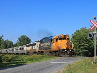 Engineman Wayne gives photographer Wayne the usual greeting as they meet once again at the Old Muskoka Road crossing on Labour Day, 2012.