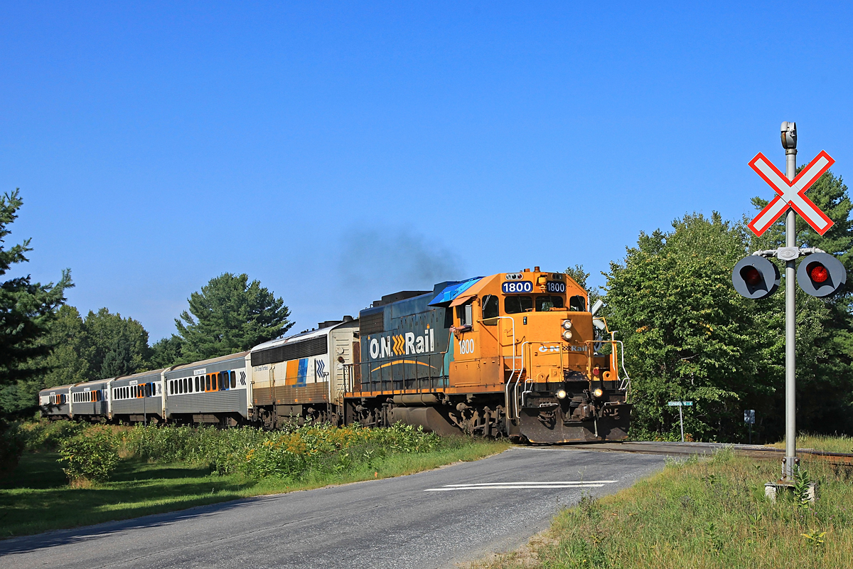 Engineman Wayne gives photographer Wayne the usual greeting as they meet once again at the Old Muskoka Road crossing on Labour Day, 2012.