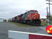 CN 120 2½ miles long as usual goes by at a good speed with 8899 and 2641 trailing.