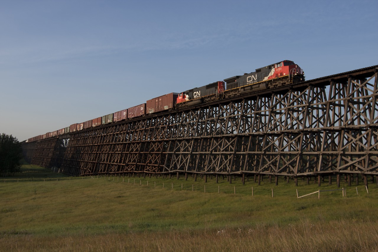Westbound tip toes over the impressive Paddle River Trestle
