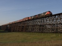 Westbound tip toes over the impressive Paddle River Trestle