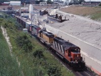 CN 382 grinds out of the old Sarnia Tunnel as work on the new bore and approaches continue