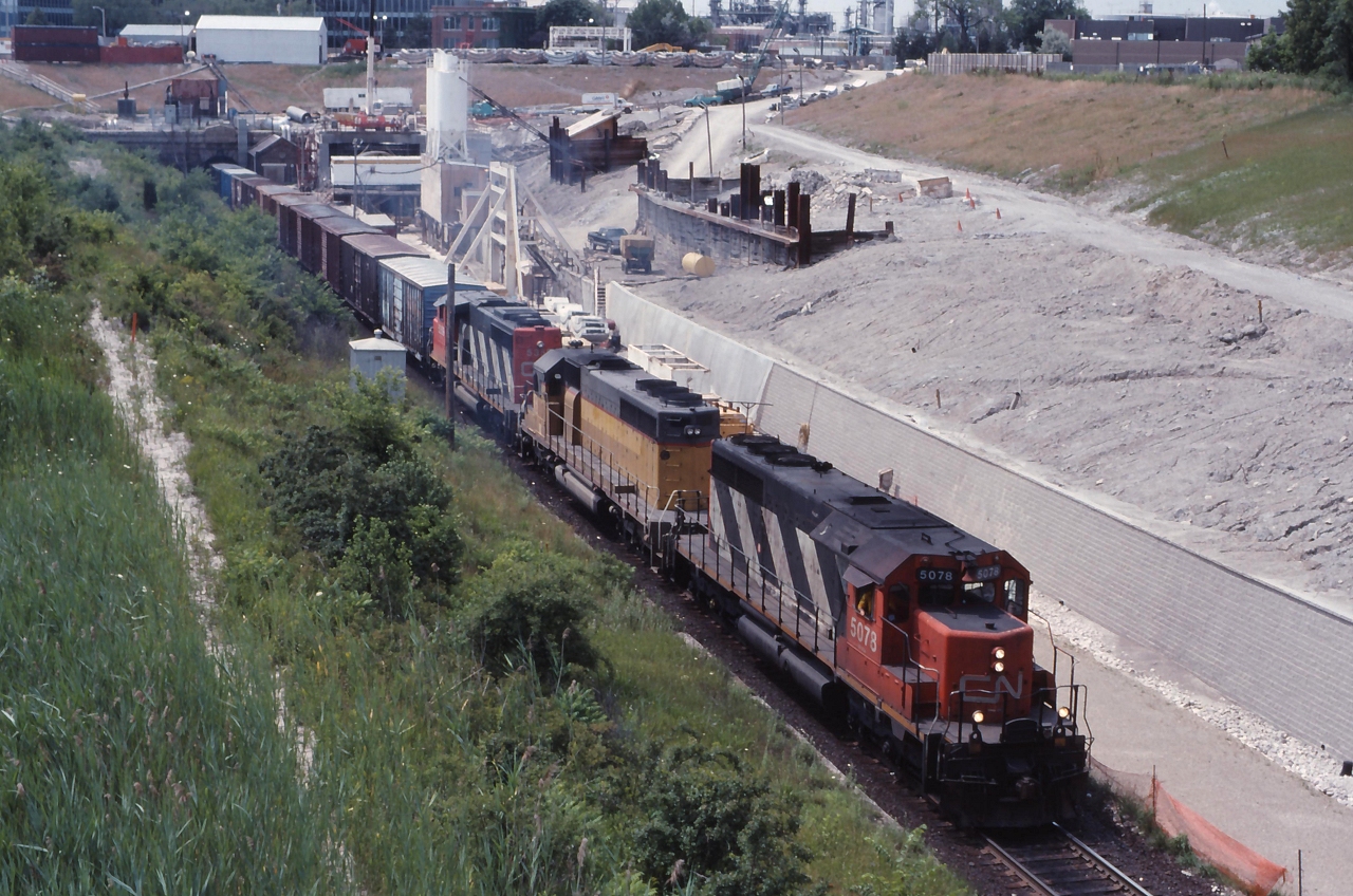 CN 382 grinds out of the old Sarnia Tunnel as work on the new bore and approaches continue