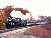 CN 6060 leads an excursion train into Bayview as fall colours have hit their peak in 1973