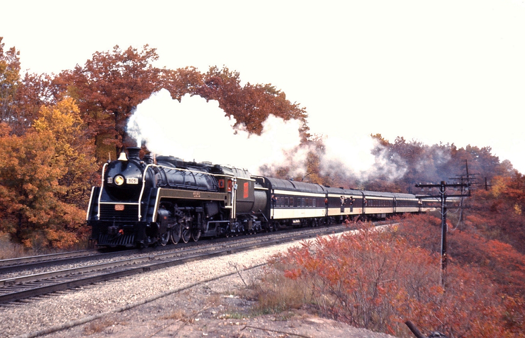 CN 6060 leads an excursion train into Bayview as fall colours have hit their peak in 1973