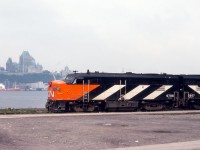 CN #11 makes a station stop at Levis Quebec, across the St. Lawrence River is the Chateau Frontenac, a CPR Hotel.  