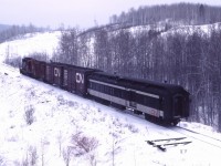 CN combine #7189 brings up the rear of train 278, the mix train between Thunder Bay and Sioux Lookout.  Conmee was the junction between the Kashabowie Sub to Atikokan and the Graham Sub up to The Allanwater Sub a few miles east of Sioux Lookout.