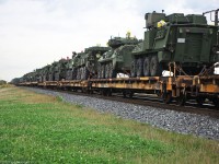 An expensive military load on CN 753 the second train of its kind in a month.