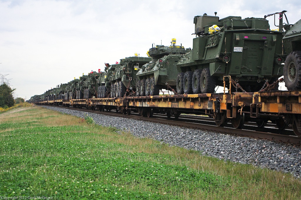 An expensive military load on CN 753 the second train of its kind in a month.