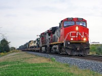 CN 753 military train runs through Hagerman's on its way to a crew change at Doncaster where it will continue on the Bala Sub Northward.