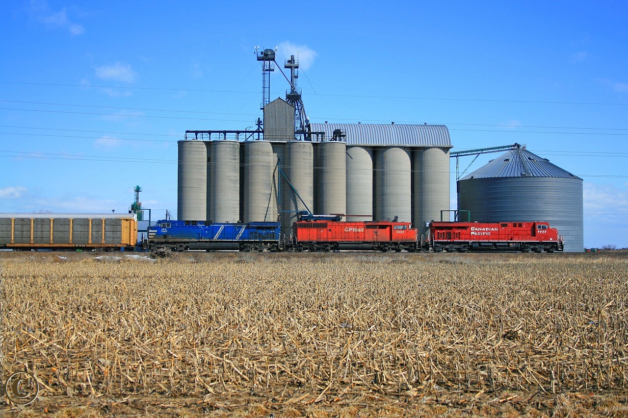 CP 8833 and trailing units CP 9021, CEFX 1046 lead train 158 at mile 85.9 on the CP's Windsor Sub, Haycroft Ontario March 20, 2008.