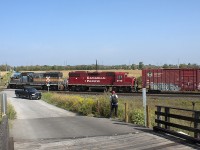 And the Jackass award goes to the douche bag in the pick up truck for stopping in the middle of the road and here`s a tip don't run the crossing to get across to the other side when the lights are flashing and bells are going off. After dropping off his son at the crossing he runs crossing to get to the other side of the tracks What example do your set for you son when you do that?