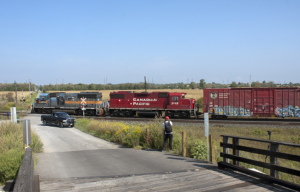 And the Jackass award goes to the douche bag in the pick up truck for stopping in the middle of the road and here`s a tip don't run the crossing to get across to the other side when the lights are flashing and bells are going off. After dropping off his son at the crossing he runs crossing to get to the other side of the tracks What example do your set for you son when you do that?