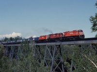 CP 509 crosses the trestle at Cherrywood behind M636 4702, M630 4511 and an RS18u 1828