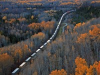 Fading light and the last of the fall colour change across the lowlands of Lake Superior's Kama Bay sees CP 9825 and 9860 roll westward with Toronto to Edmonton train 103 at mile 45.9 on the CP's Nipigon Sub October 9, 2010.