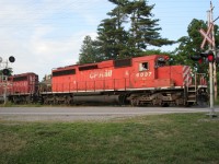 The westbound London pick-up rumbles across Oxford Road 3 towards Blandford siding and points west. 