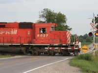 CP 6037 West prepares to enter CTC Wolverton from Galt on a warm summer evening.