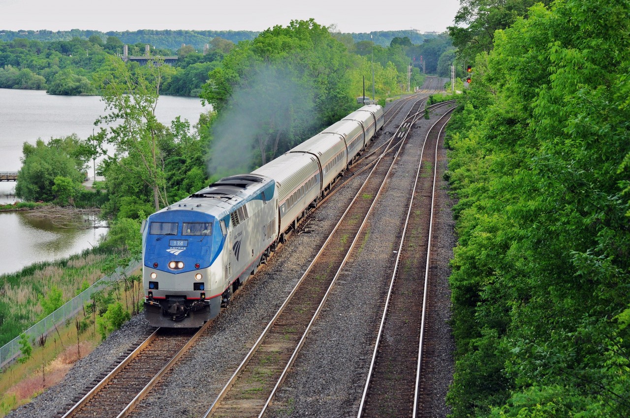 Via / Amtrak #98 breezes through – on time -  CN Bayview Jct. On a warm and  humid May 30, 2012 afternoon. Image by S.Danko