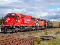 CP 441 led by recently rebuilt CP 6234 (former SOO 6034) takes the siding in Tilbury to let an oncoming CP 244 to pass by.