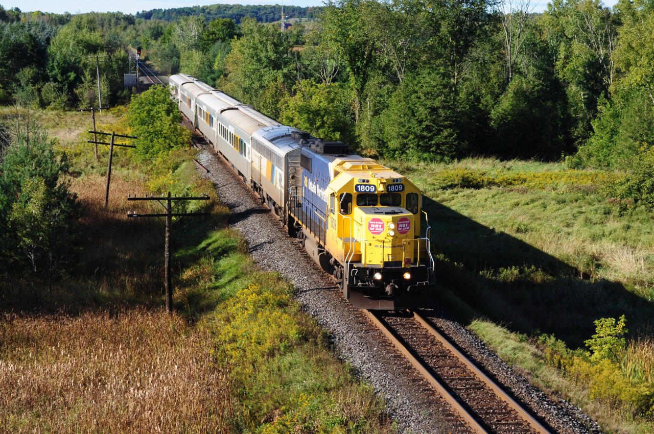 On a cool September 19, 2012 morning at 09:37 a.m., ONR 697 – The Northlander – rolls north near CN Bala Subdivison mile 40.5 (Mount Albert), on the approach to Zephyr, Ontario. 697 required 58 minutes to travel some 40.5 miles - an average 42 miles per hour. Image by S. Danko.