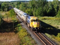 On a cool September 19, 2012 morning at 09:37 a.m., ONR 697 – The Northlander – rolls north near CN Bala Subdivison mile 40.5 (Mount Albert), on the approach to Zephyr, Ontario. 697 required 58 minutes to travel some 40.5 miles - an average 42 miles per hour. Image by S. Danko.