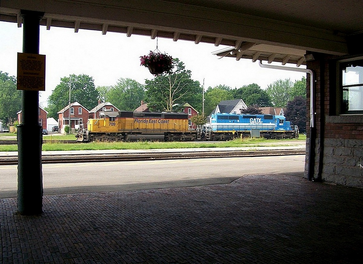 FEC (SD40-2)709, GSCX (SD40-2)7369 resting between assignments.  Spotted idling at Stratford ON 9am Thursday June 27th 2010 f4.0 x 35mm 1200pxls.