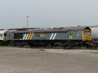 Back when EMD of London ON was the primary plant of Electro-Motive's locomotive manufacturing, they built North American freight units as well as those for foreign railroads overseas. Fastline Freight 66303 is just one of an "Export Special" of 9 Class 66 units (EMD model JT42CWR-T1) sitting inside CN's Mimico Yard in Etobicoke awaiting export to the UK, France and The Netherlands. 66303 would be moved to the Toronto Port Authority, loaded up on the Jumboship MV Daniella, cross the Atlantic Ocean and be unloaded in Newport, UK later that month (*note, photo taken from entranceway on public property looking into yard).