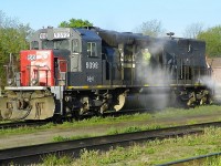 GEXR (SD45T-2)9392 xSP - 'Spray & wash' ( Actually seeking an oil leak ) Stratford ON 7.30am Monday May 14th 2012 - f4.0 x 87mm.