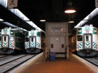 Union Station in the afternoon, before the rush. GO cab cars 203, 233 and 238 share a quiet moment together on Tracks 1, 2 and 3 at the west end of the 1920's "Bush" style train shed. 