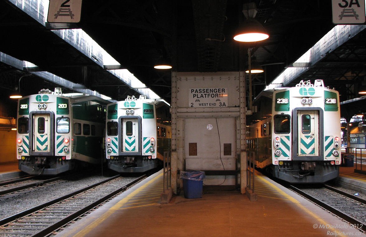 Union Station in the afternoon, before the rush. GO cab cars 203, 233 and 238 share a quiet moment together on Tracks 1, 2 and 3 at the west end of the 1920's "Bush" style train shed.