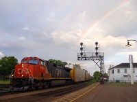 IC 2725 leading 277 under a double rainbow at Brantford