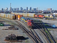 A pair of DM&E units along with 9649 and yard power sit quietly on a Sunday Morning.