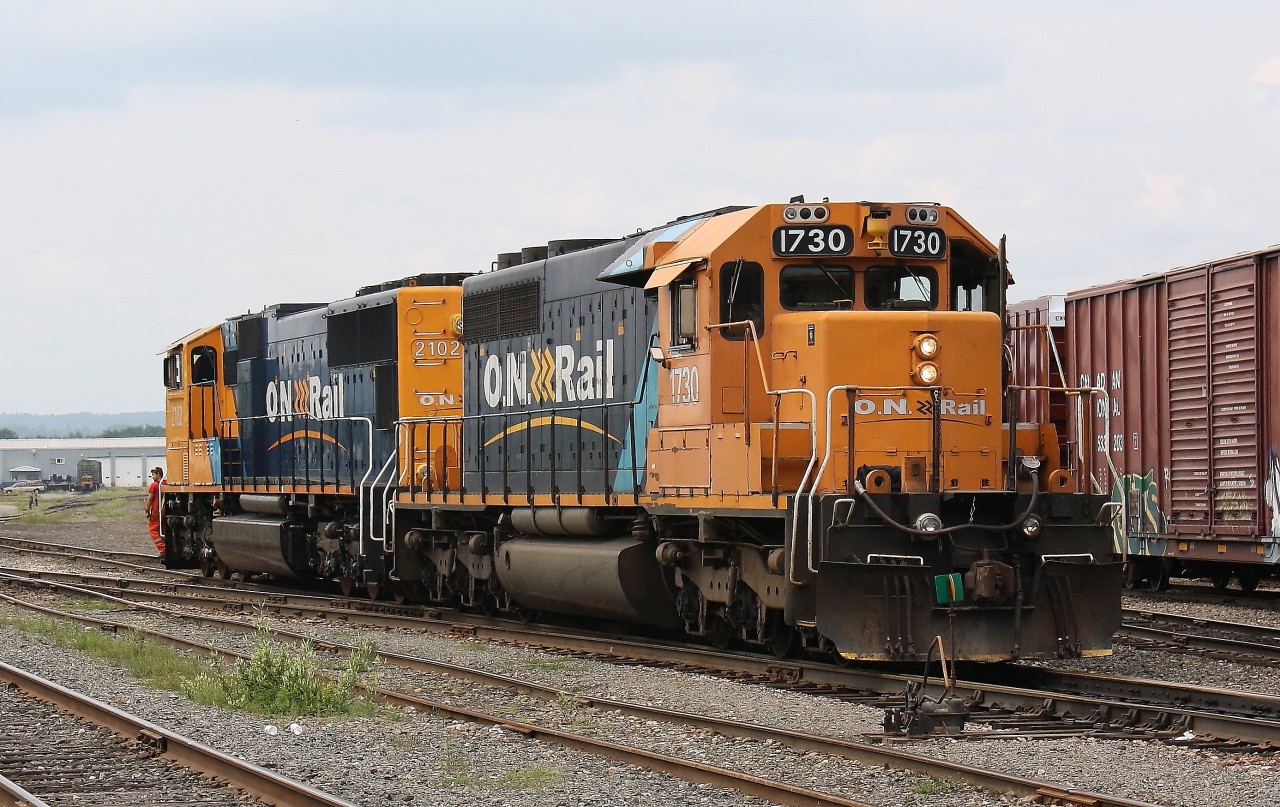 ONT 1730 and ONT 2102 roll through the yard at Englehart.  They will be heading North soon for Cochrane.