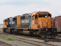 ONT 1730 and ONT 2102 roll through the yard at Englehart.  They will be heading North soon for Cochrane.