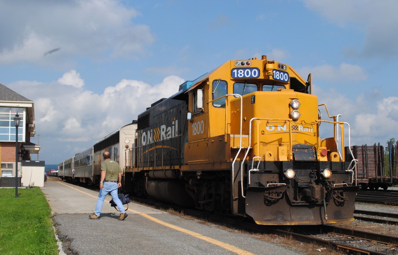 A crew change as the conductor exits GP38-2 on the southbound Northlander as the train makes its stop at Englehart
