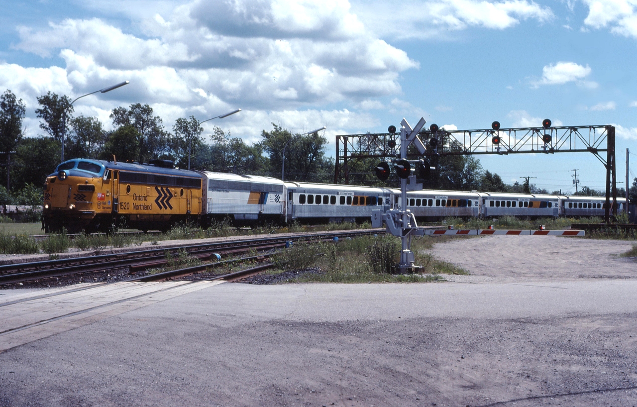 ONT 697 rolls into Washago for a station stop.