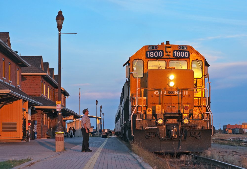 Basking in the warm summers evening light, the ride from Toronto, ONT 121 is almost set to depart to the shops. A passenger has a chat with the engineer before getting the signal to proceed ahead by the conductor.