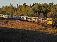 The Northlander curves through Mount Albert as it rides the red blocks of CN 316. A lot of clear to stop signals allows one to get ahead of the train for a few bonus shots on the south end of the Bala. 1815hrs.