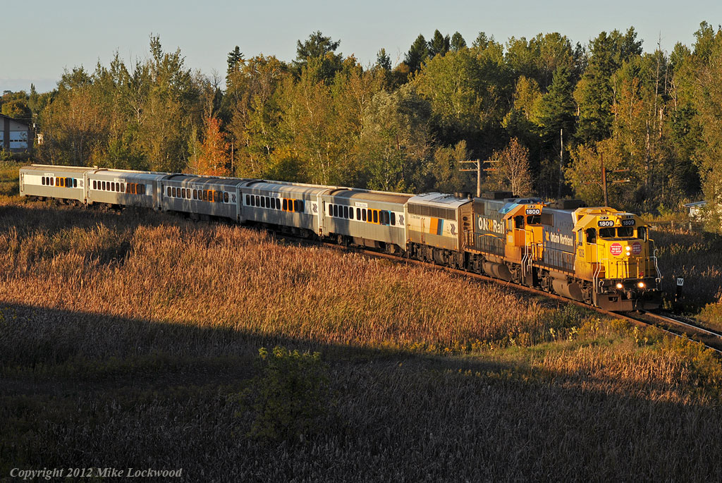 The Northlander curves through Mount Albert as it rides the red blocks of CN 316. A lot of clear to stop signals allows one to get ahead of the train for a few bonus shots on the south end of the Bala. 1815hrs.
