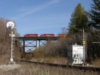 The dead silence of the Don Valley is broken as the whine of the dyno's of a GP38 & 2 SD40's rumble westwards over the Valley and CN's Bala Subdivision in perfect morning sunshine.