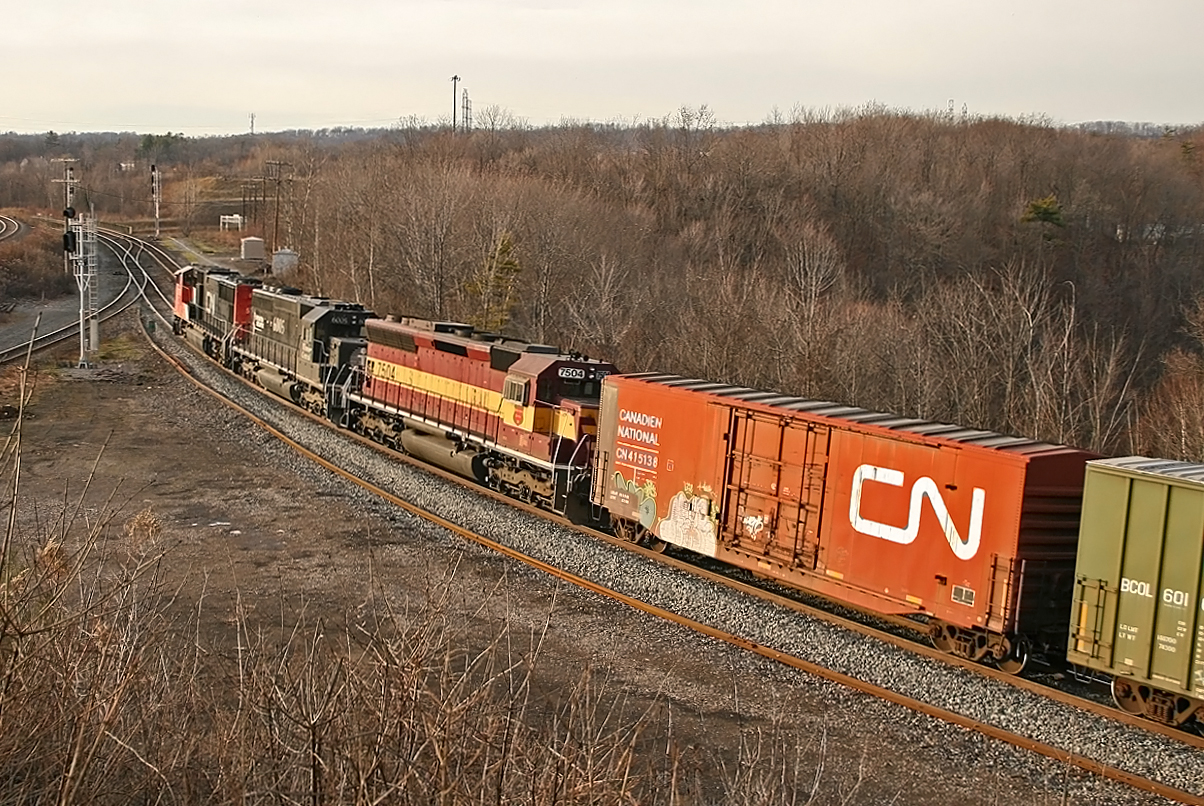 Less than six years ago, by my how things have changed! CN SD75I 5756 leads IC SD40-2 OLS 6005 and WC SD456u 7504 up onto the Dundas Sub. This was the last time I ever saw an SD45 that I can recall.
