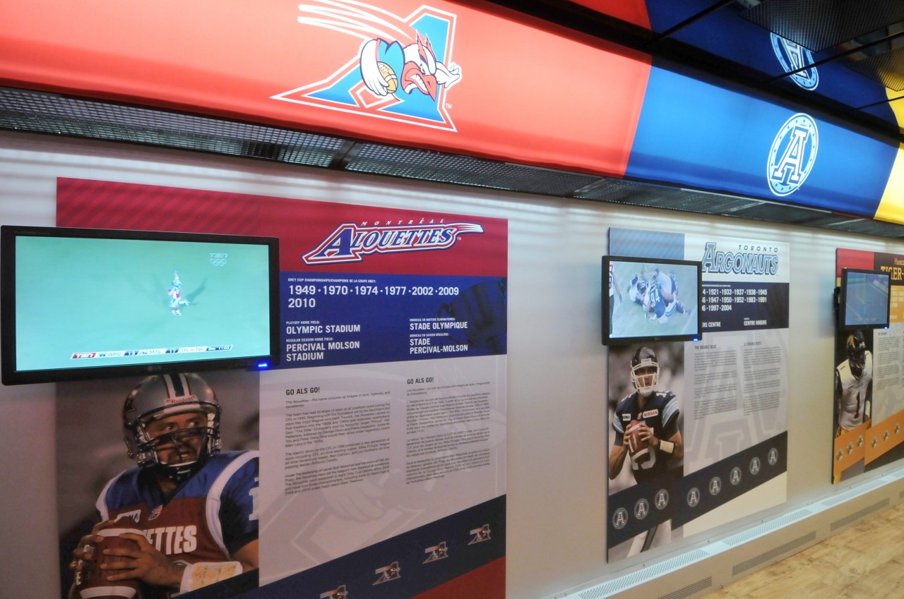 The Interior of the "Locker Room Car" (Canadian Pacific coach) of the CFL's 100th Anniversary of the Crey Cup Tour train