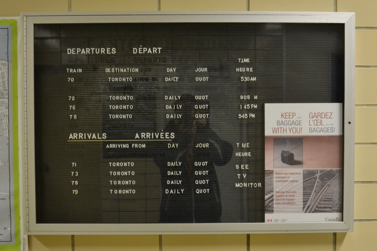 The Departure & Arrival board, inside the VIA Station in Windsor. If you look closely, you can see some of the old train numbers (ex #74 & #77) and also the old Departure & Arrival times of soem trains. This board has been in this location for at least 25 to 30 years and is almost done its life, as VIA Rail is moving into a new Station next door, and will not need this sign anymore.
