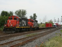 CN 7046 and 4100 slowly drag X556 towards the yard at Aldershot.  In tow is CEBX 800, the worlds largest Schnabel car carrying a piece of equipment manufactured at Hooper Welding in Oakville Ontario.  Over the next few weeks CN and BNSF would limp this massive load to its destination in Kansas