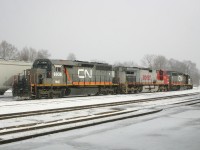 CN 148's power today is WC 6935, BNSF 794 and WC 6936 idle in the yard at Brantford as they figure out which unit to set off for 399, who is sitting at Hardy.  Initially WC 6936 was to be donated, however BNSF bolts their MU cables to their locomotives, thus forcing 148 to give 399 the BNSF 794 - Which, luckily for us would lead westward after wyeing at Bayview!