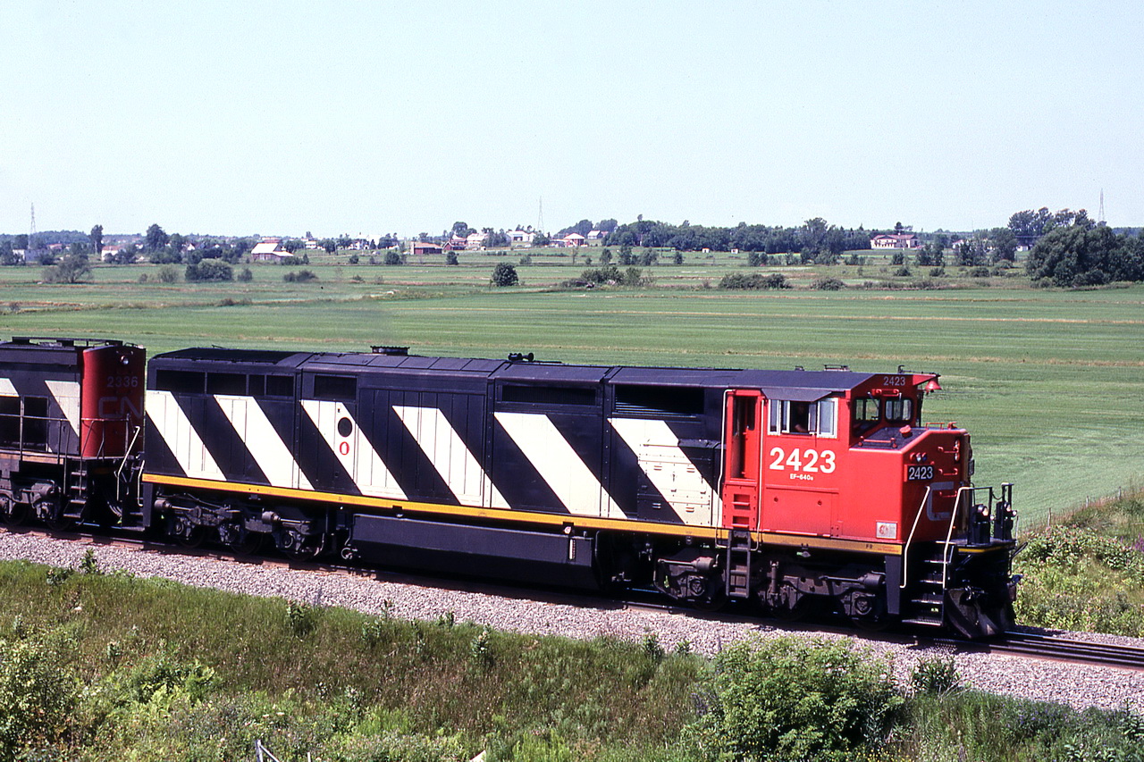 CN 208,s lead unit 2423 and older 2336 trailing.
