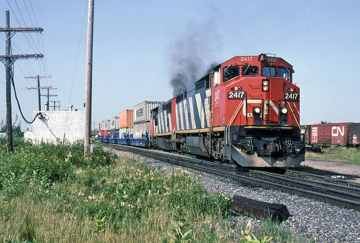 CN 207 takes off with 2317 getting back on the main after a meet.