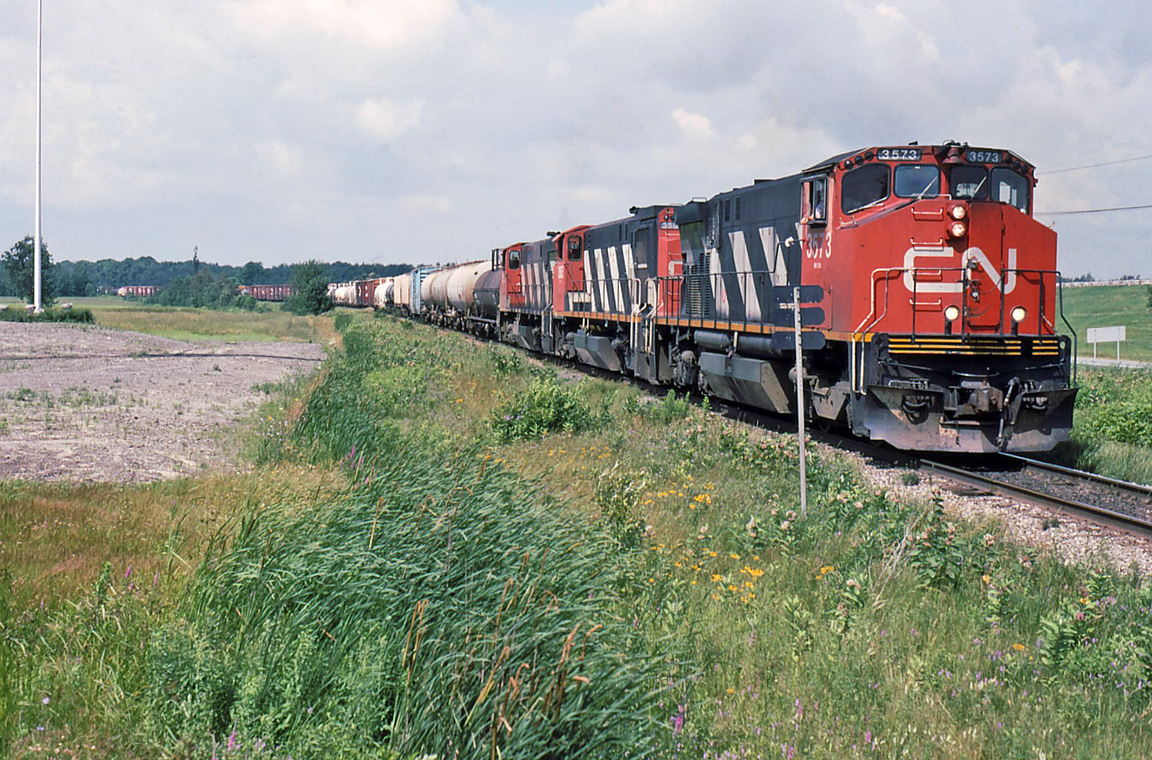 CN 312 with its usual M420s on its way to Moncton NB.
